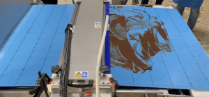 Nettoyage automatique tapis convoyeur en chocolaterie industrielle